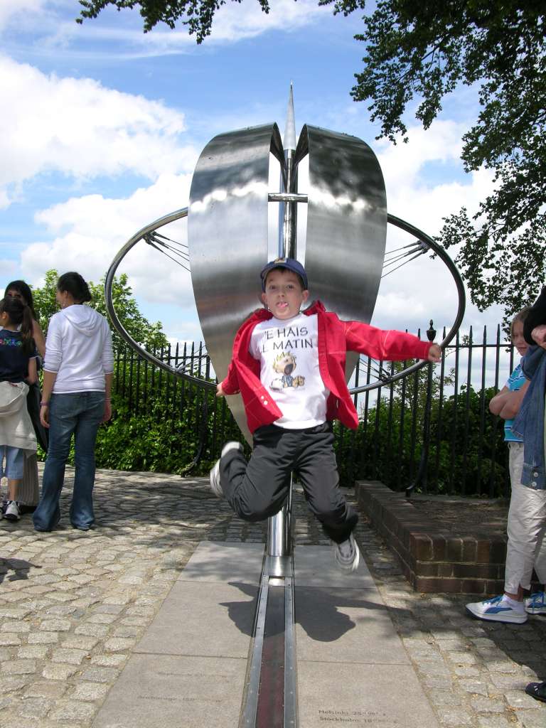 London 01 16 Greenwich Longitude 0 The Prime Meridian of Longitude 0 was fixed at London�s Royal Observatory Greenwich in 1894. Peter jumped over the line, and fell to 0 and 360 degrees at the same time. I guess he should call himself Stretchy Pete. Greenwich Mean Time is used as a time reference throughout the world.